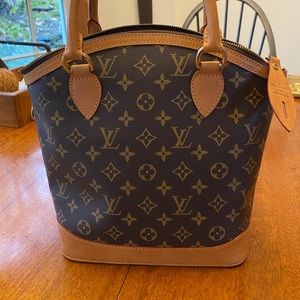 Louis Vuitton Lockit handbag monogram leather